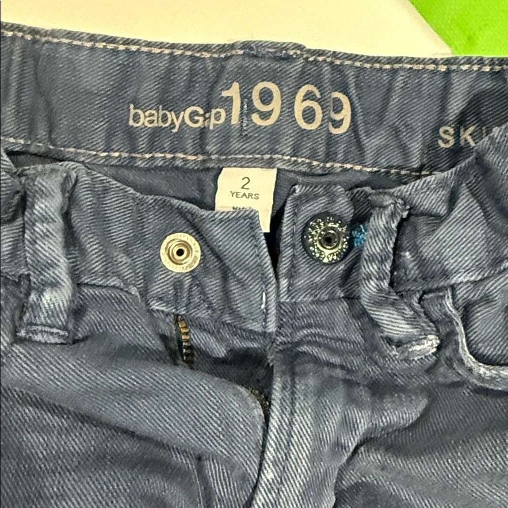 GAP Kids Jeans in Blue and Gray. One red H&M pair.